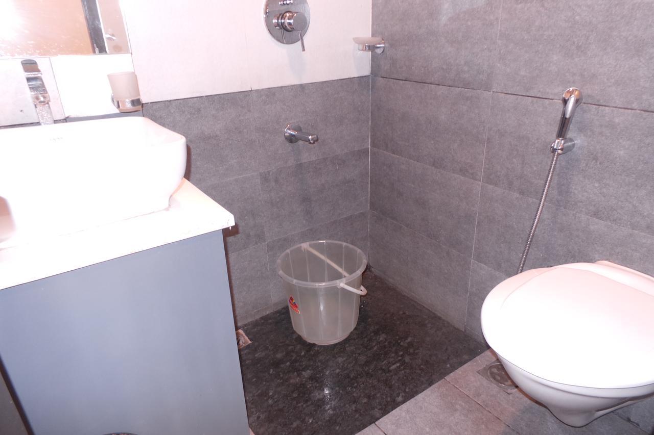 Saas Residency Hotel Кожикод Екстериор снимка