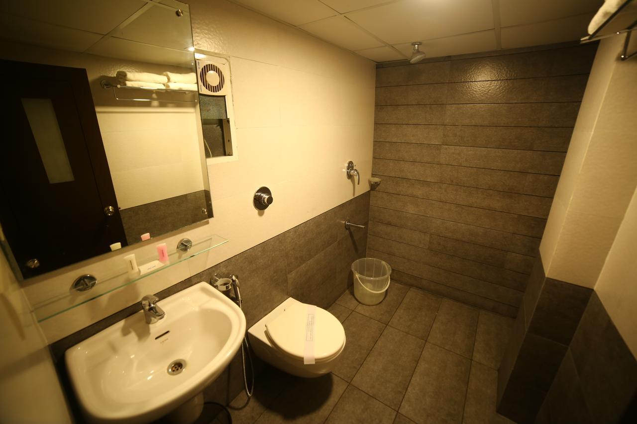 Saas Residency Hotel Кожикод Екстериор снимка